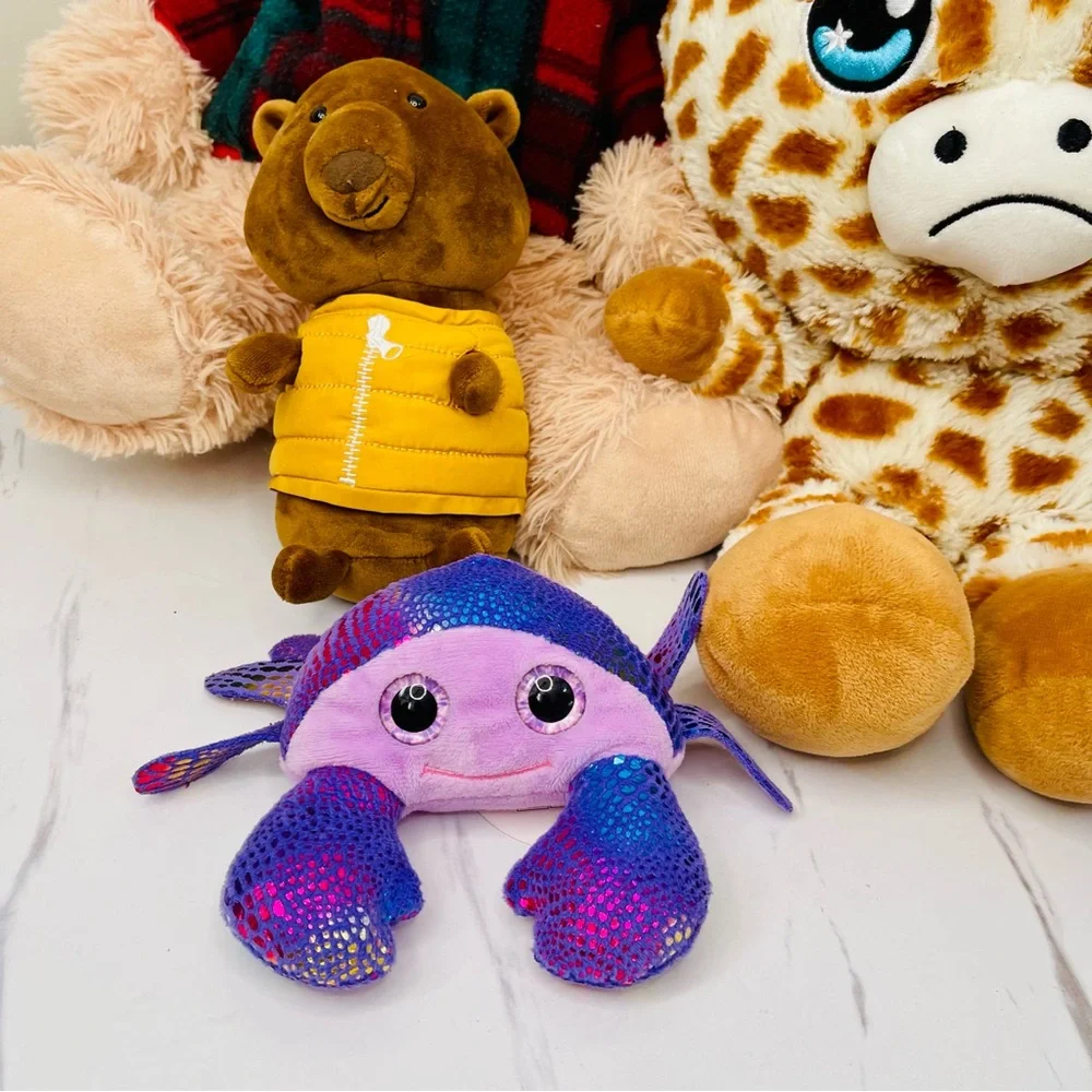 A lot of four Plush Giraffe, Tadebeare, Pig, and Fish Toy Set